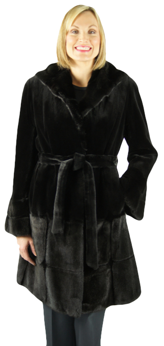 Dyed black sheared 39" parka with double fur hood. Trimmed with black mink. Item # NC-318